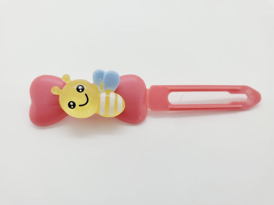 Yellow Bumblebee on a pink Top Knot Clip for dogs