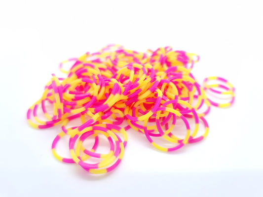 Gummibänder mit Knoten in Gelb und Rosa