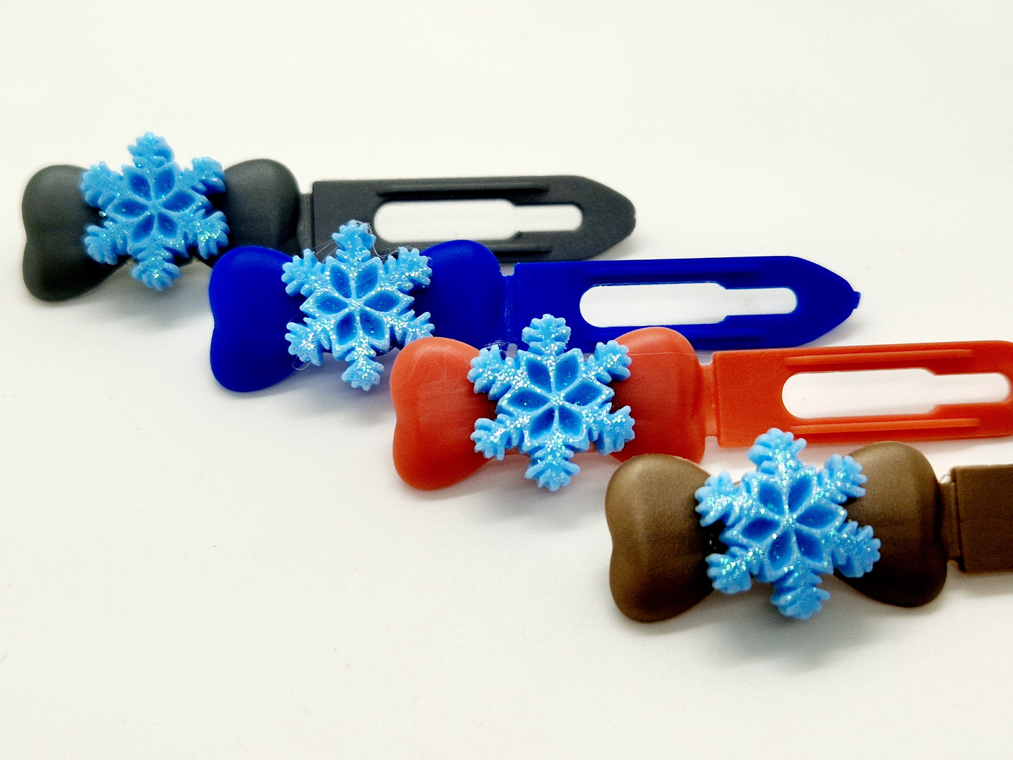 Blue glitter snowflake top knot clips