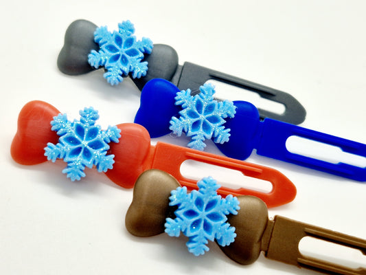 Blue glitter snowflake top knot clips