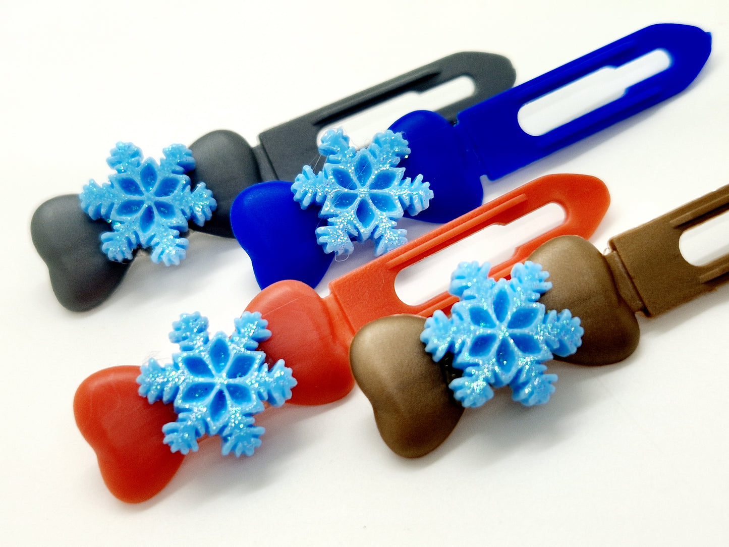 Blue glitter snowflake top knot clips