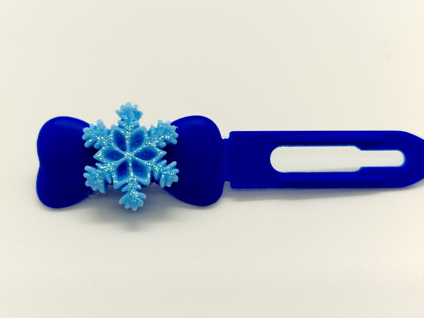 Blue glitter snowflake top knot clips