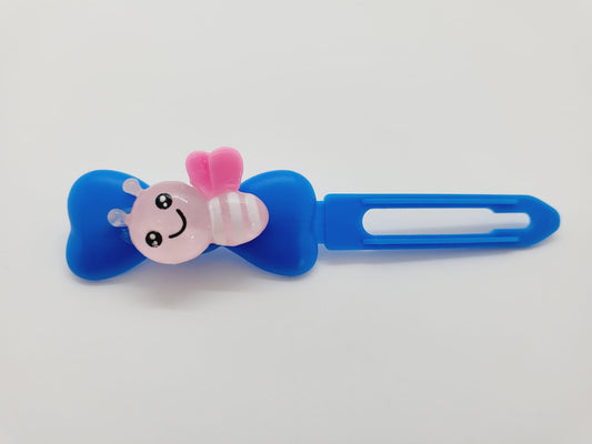 Pink Bumblebee on a royal blue Top Knot Clip for dogs