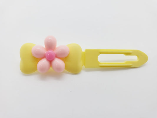 Pretty Pink Flower on a summer yellow Top Knot Clip for dogs