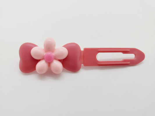 Pretty Pink Flower on a pretty pink Top Knot Clip for dogs